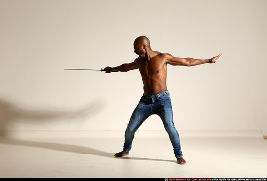 Man Adult Athletic Black Fighting with sword Moving poses Pants