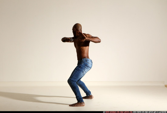 Man Adult Athletic Black Fighting with sword Moving poses Pants