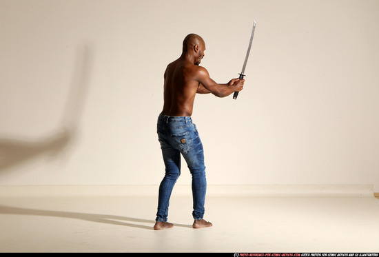 Man Adult Athletic Black Fighting with sword Moving poses Pants