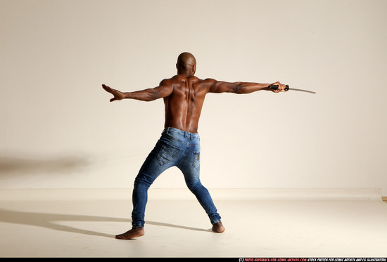 Man Adult Athletic Black Fighting with sword Moving poses Pants