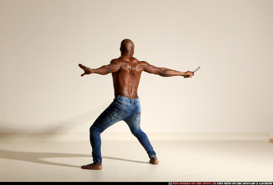 Man Adult Athletic Black Fighting with sword Moving poses Pants