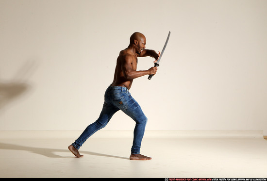 Man Adult Athletic Black Fighting with sword Moving poses Pants