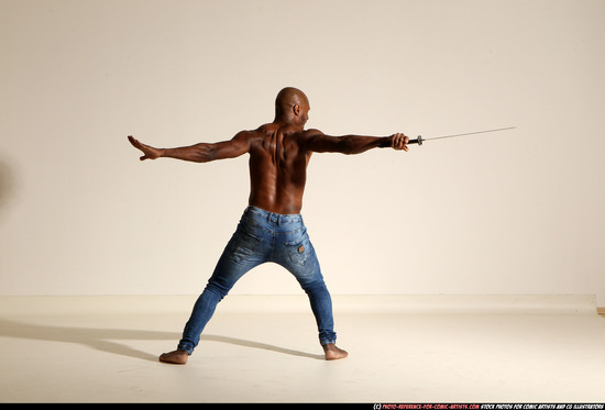 Man Adult Athletic Black Fighting with sword Moving poses Pants