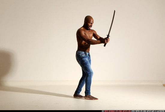 Man Adult Athletic Black Fighting with sword Moving poses Pants