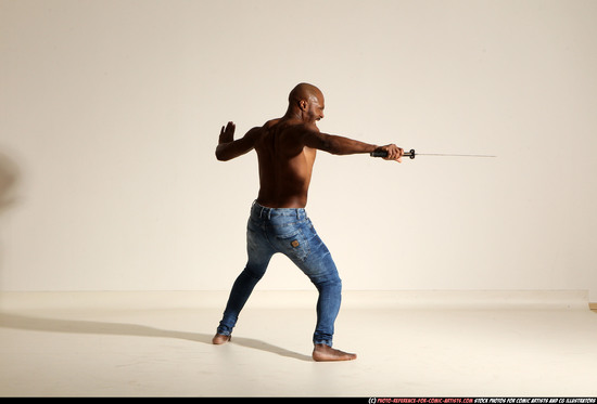 Man Adult Athletic Black Fighting with sword Moving poses Pants