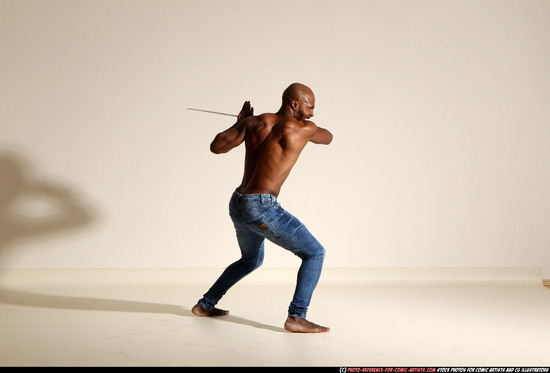 Man Adult Athletic Black Fighting with sword Moving poses Pants