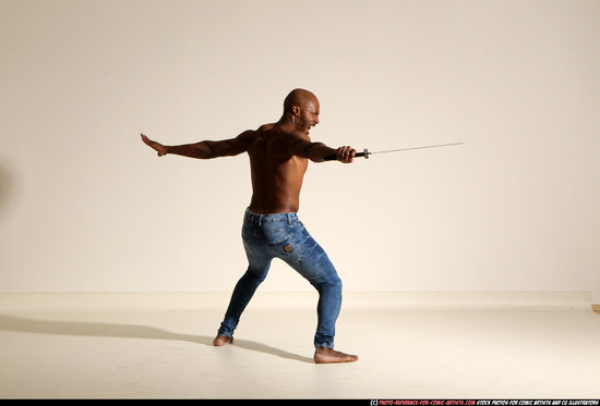 Man Adult Athletic Black Fighting with sword Moving poses Pants