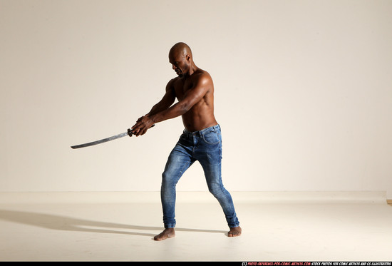 Man Adult Athletic Black Fighting with sword Moving poses Pants