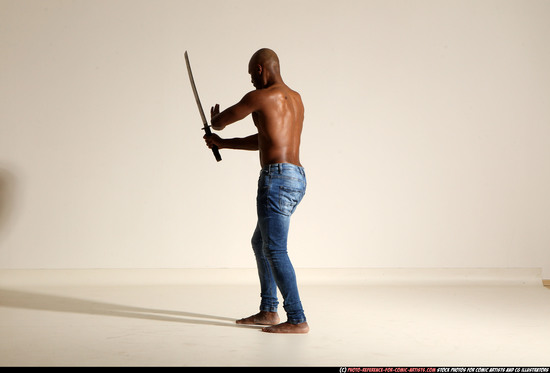 Man Adult Athletic Black Fighting with sword Moving poses Pants