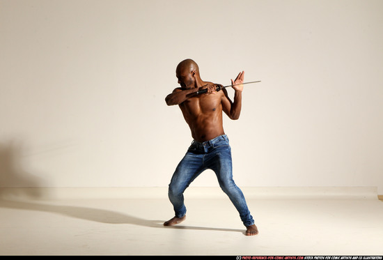 Man Adult Athletic Black Fighting with sword Moving poses Pants