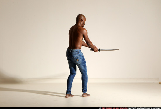 Man Adult Athletic Black Fighting with sword Moving poses Pants