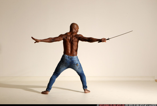 Man Adult Athletic Black Fighting with sword Moving poses Pants