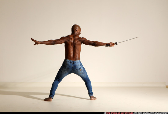 Man Adult Athletic Black Fighting with sword Moving poses Pants