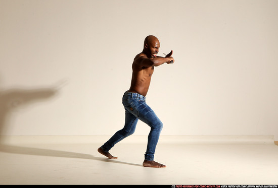 Man Adult Athletic Black Fighting with sword Moving poses Pants