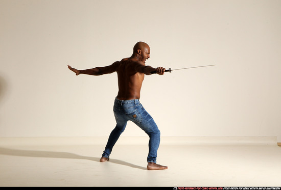 Man Adult Athletic Black Fighting with sword Moving poses Pants