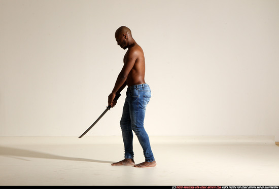 Man Adult Athletic Black Fighting with sword Moving poses Pants