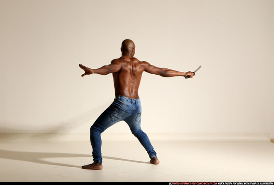 Man Adult Athletic Black Fighting with sword Moving poses Pants