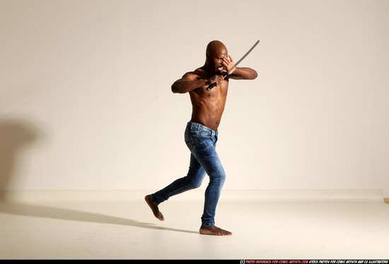 Man Adult Athletic Black Fighting with sword Moving poses Pants