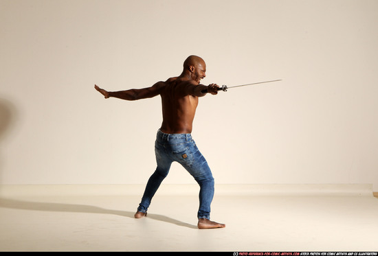 Man Adult Athletic Black Fighting with sword Moving poses Pants