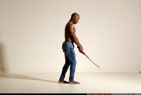 Man Adult Athletic Black Fighting with sword Moving poses Pants