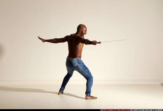 Man Adult Athletic Black Fighting with sword Moving poses Pants