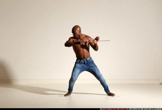 Man Adult Athletic Black Fighting with sword Moving poses Pants