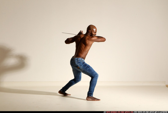 Man Adult Athletic Black Fighting with sword Moving poses Pants