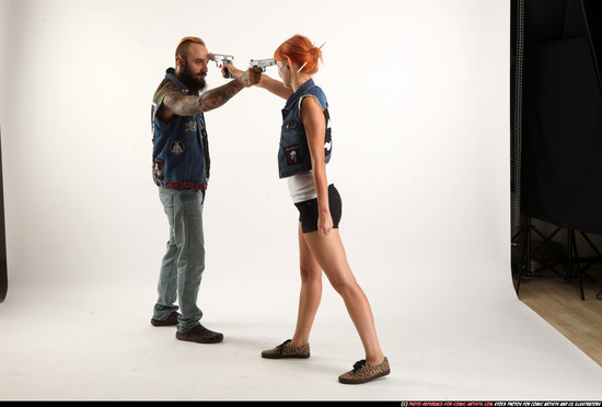 Man & Woman Adult Athletic White Fighting with gun Standing poses Casual