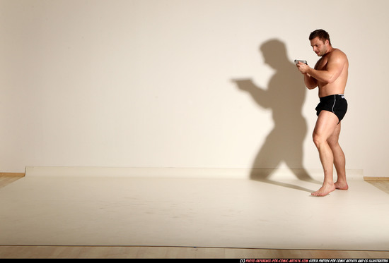 Man Adult Muscular White Fighting with gun Moving poses Underwear