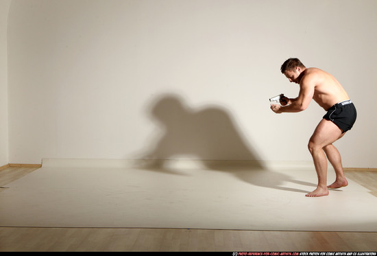 Man Adult Muscular White Fighting with gun Moving poses Underwear