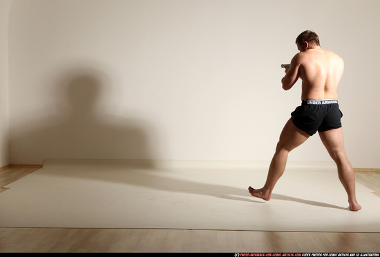 Man Adult Muscular White Fighting with gun Moving poses Underwear