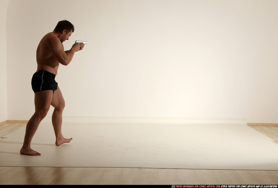 Man Adult Muscular White Fighting with gun Moving poses Underwear