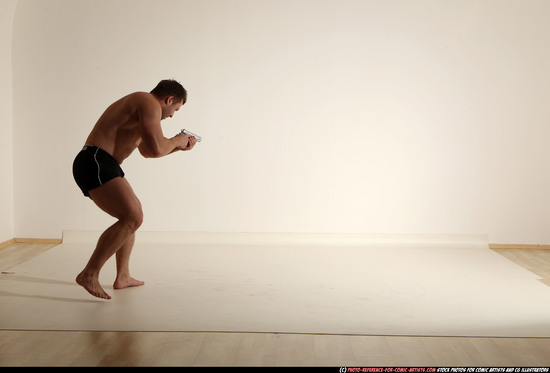 Man Adult Muscular White Fighting with gun Moving poses Underwear