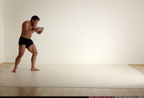 Man Adult Muscular White Fighting with gun Moving poses Underwear