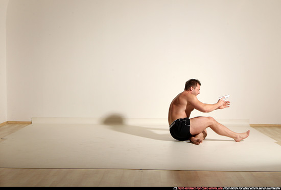 Man Adult Muscular White Fighting with gun Moving poses Underwear