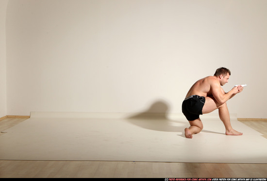 Man Adult Muscular White Fighting with gun Moving poses Underwear