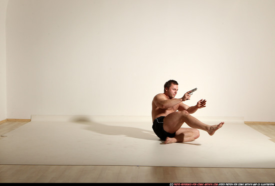 Man Adult Muscular White Fighting with gun Moving poses Underwear