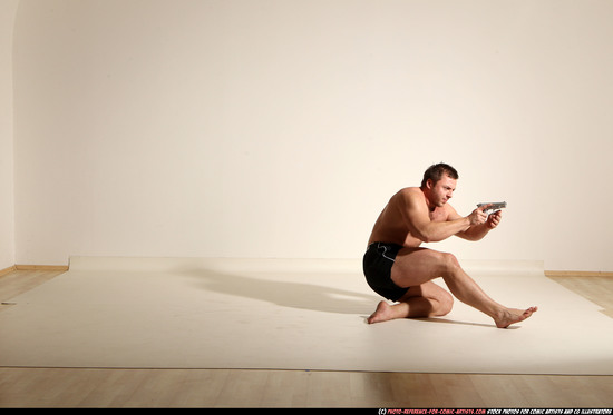 Man Adult Muscular White Fighting with gun Moving poses Underwear