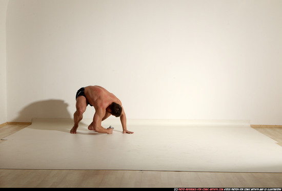 Man Adult Muscular White Fighting with gun Moving poses Underwear