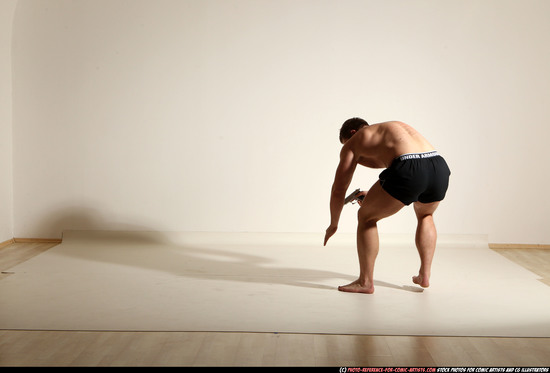 Man Adult Muscular White Fighting with gun Moving poses Underwear