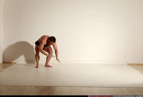 Man Adult Muscular White Fighting with gun Moving poses Underwear