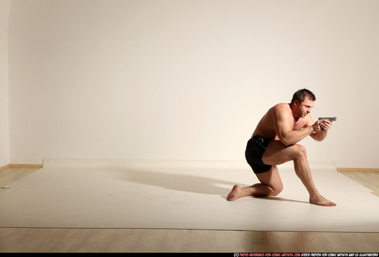 Man Adult Muscular White Fighting with gun Moving poses Underwear