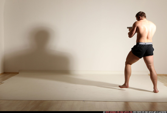 Man Adult Muscular White Fighting with gun Moving poses Underwear