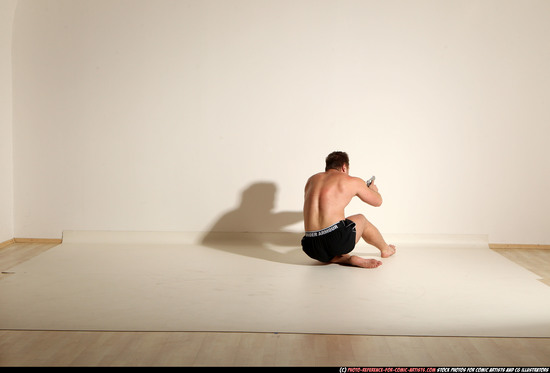 Man Adult Muscular White Fighting with gun Moving poses Underwear