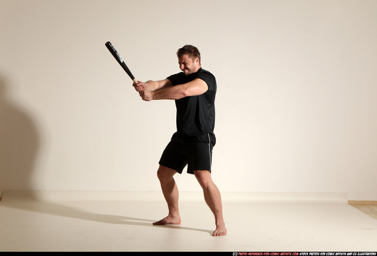 Man Adult Muscular White Moving poses Sportswear Fighting with bat