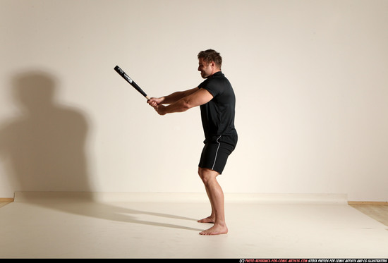 Man Adult Muscular White Moving poses Sportswear Fighting with bat