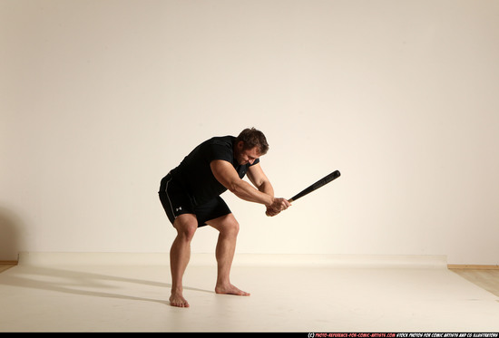 Man Adult Muscular White Moving poses Sportswear Fighting with bat