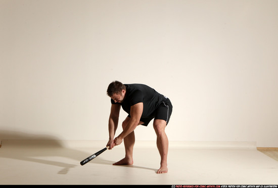 Man Adult Muscular White Moving poses Sportswear Fighting with bat