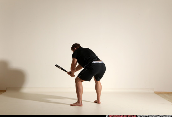 Man Adult Muscular White Moving poses Sportswear Fighting with bat