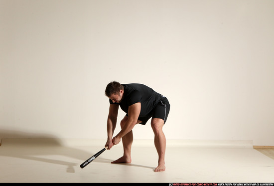 Man Adult Muscular White Moving poses Sportswear Fighting with bat